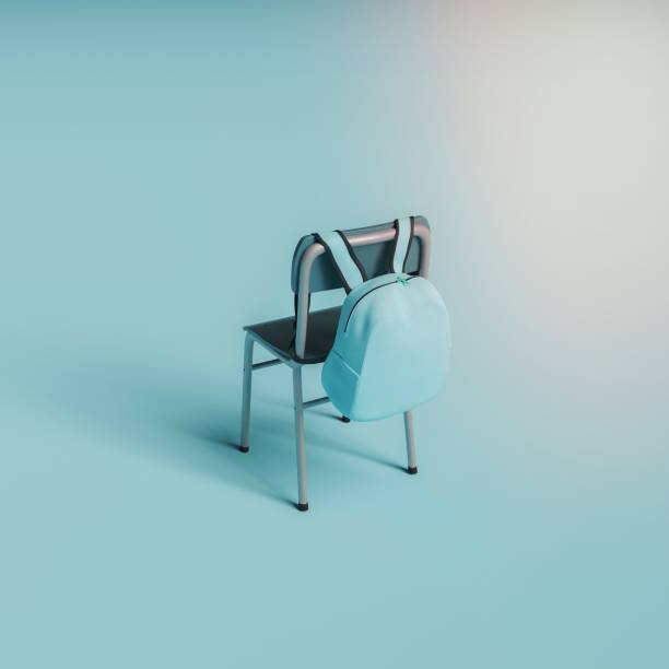 минимальный стул с подвесным школьным мешком - school стоковые фото и изображения