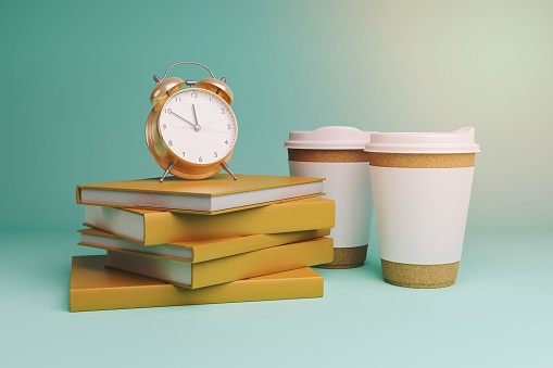 alarm clock on a pile of books and coffee cups next to it. concept of education, back to school and studying. 3d render