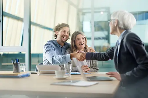 estate planning in texas is a comprehensive and vital process that aims to ensure the smooth management and distribution of your assets and affairs when you pass away, happy couple came to an agreement with their agent in the office