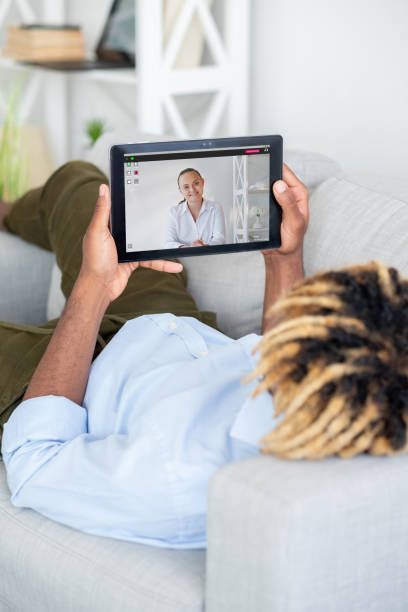istock video call virtual chat relaxed couple on tablet 1465463558