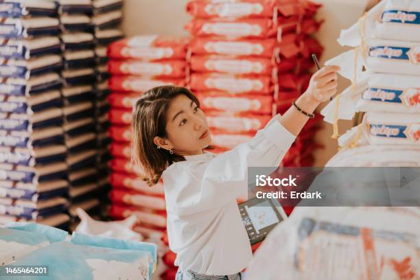 Checking Quality Of Rice Sack Before Delivery To Customer Stock Photo - Download Image Now