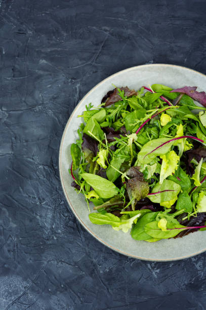 istock Fresh green salad, top view. 1465470446