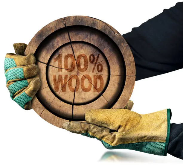 Photo of Gloved Hands Holding a Tree Trunk with Text One Hundred Percent Wood