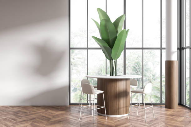 istock Light cafe interior with seats and round table near panoramic window. Mockup wall 1465475493