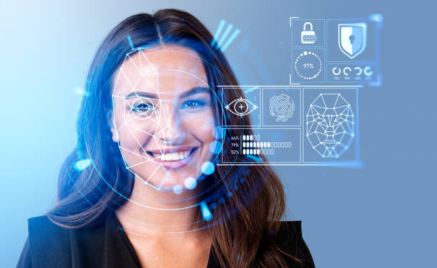 istock Smiling businesswoman watching at digital interface with facial recognition 1465476073