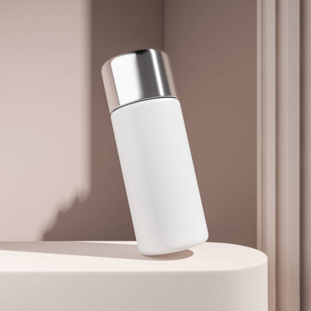 istock White bottle on beige platform, mockup for product display 1465476380