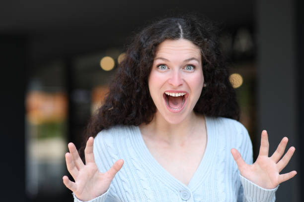 istock Surprised woman looking at camera 1465481677