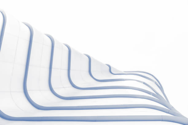 Elegant Curves and Lines of Modern Architectural Excellence Under Clear Blue Sky