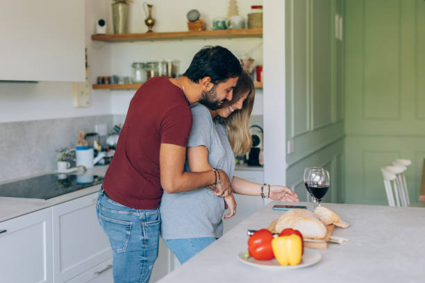 istock happy couple in home kitchen 1465481835