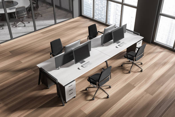 istock Top view of grey workspace interior with pc computer and armchairs 1465482402