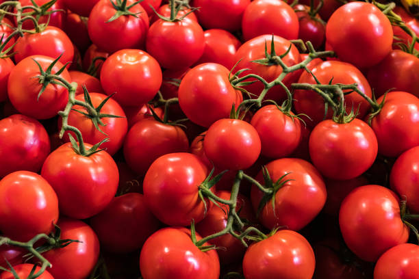 istock Red tomatoes in the market 1465483363