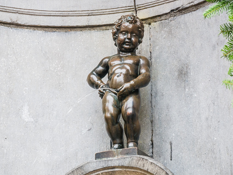 A famous statue Manneken Pis in Brussels, Belgium