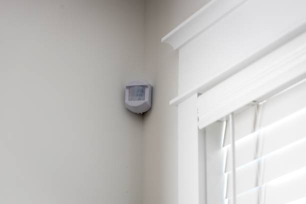 istock Alarm system mounted on the wall of a modern urban building 1465485004