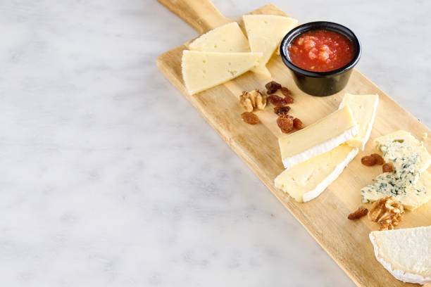 istock Top view closeup of a delicious cheese platter 1465488314
