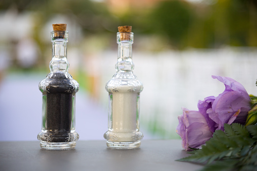 A selective focus of salt and pepper bottles on the tabel