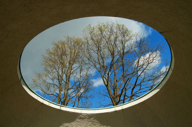 istock Oculus in a roof dome with an interesting view. 1465488792