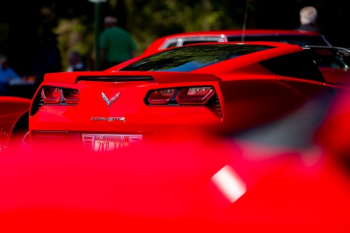 Berrien Springs, United States – September 24, 2021: The back shot of a red Chevrolet Corvette car in the street in the daytime