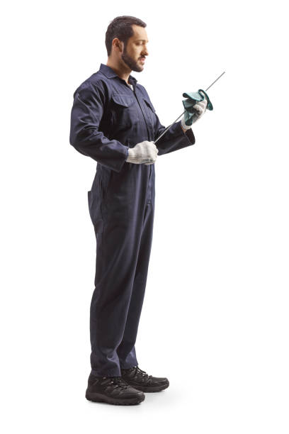 istock Auto mechanic cleaning a dipstick for oil check 1465491636