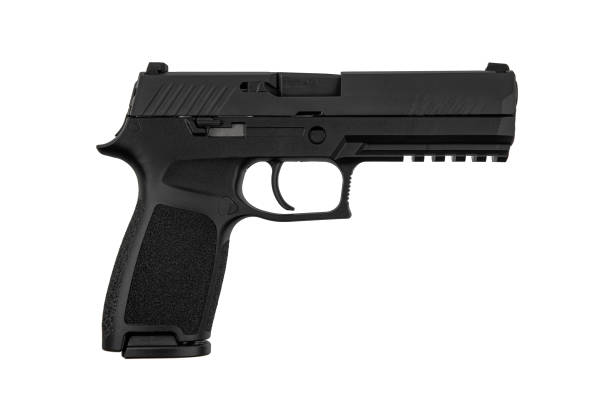 Modern semi-automatic pistol isolate on a white background. Armament for the army and police. Short-barreled weapon. Modern semi-automatic pistol isolate on a white background. Armament for the army and police. Short-barreled weapon. gun mafia handgun bullet stock pictures, royalty-free photos & images