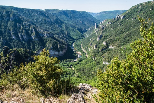 A scenic view of a green mountain range seen from Sublime Point in Lozere, France