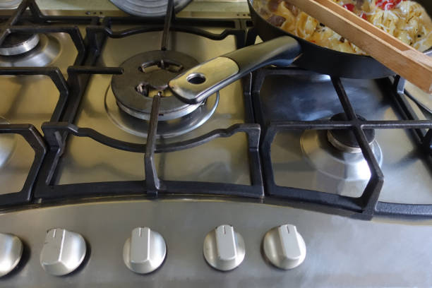 istock Gas hob   Omelet with pasta being cooked 1465496342