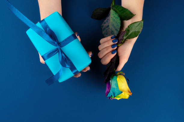 istock Fresh flowers and gift box with ribbon 1465497510