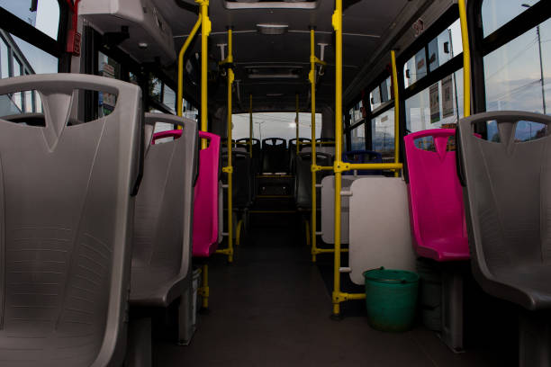 istock Inside view of an empty passenger bus with gray seats 1465497553