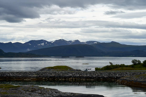 A motorhome is driving on the Atlantic Ocean Road in Norway