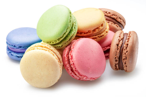 istock Colorful french macarons isolated on white background. 1465499747