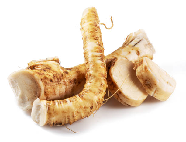 istock Horseradish roots close up isolated on white background. 1465500170