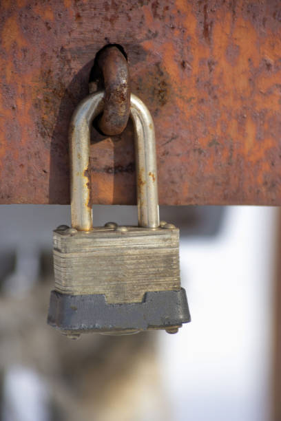 istock Closeup shot of weathered rusty padlock 1465501526