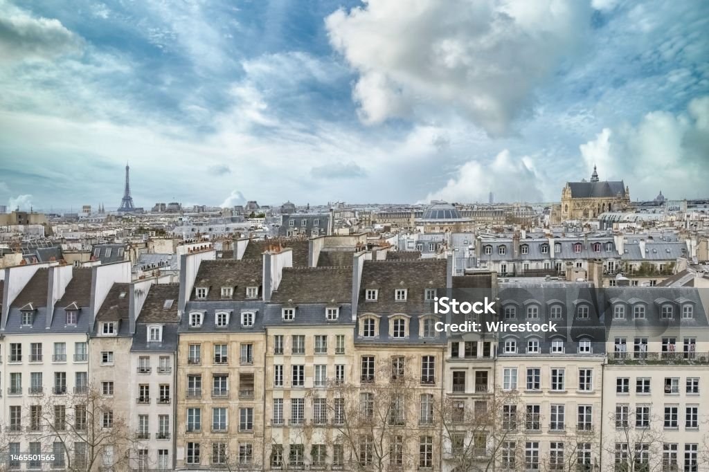 Paris, typical buildings in the Marais, aerial view Paris, typical buildings in the Marais, aerial view with the Saint-Eustache church, the Eiffel Tower and the Defense in background Pompidou Center Stock Photo