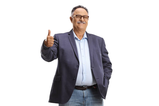istock Mature man smiling and gesturing a thumb up sign 1465501828