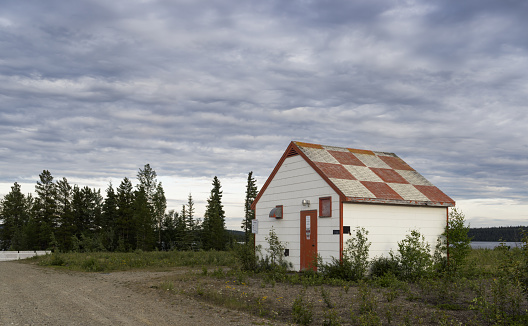 One of the support buildings at the Watson Lake Airport in the Yukon Territories of Canada. Taken during the summer after 9:00 pm.