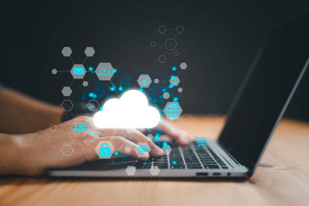 istock A businessman uses a laptop to access cloud computing, big data, the internet of things, business processes, and different storage systems. 1465504468