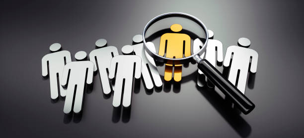 istock Magnifying glass with silver and golden 3D man icons 1465505410