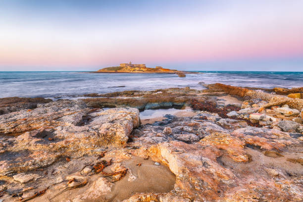 istock Dramatic evening scene of awesome spring seascape on the Passero cape Sicily. 1465505423