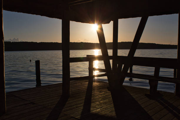 istock Sunset at the lake on a boardwalk 1465505448