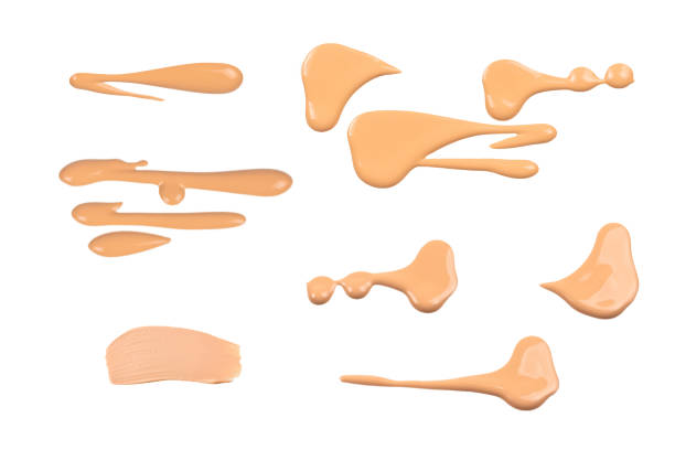 istock Liquid foundation swatch isolated on white background. Close Up of makeup cream sample. 1465505752