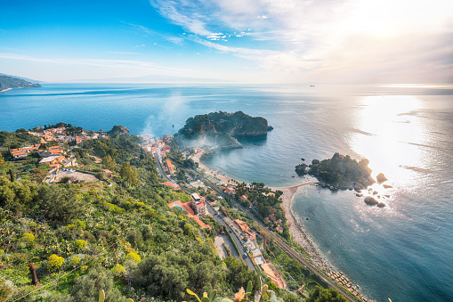 Panoramic aerial view of Isola Bella island and beach in Taormina. Giardini-Naxos bay, Ionian sea coast, Taormina, Sicily, Italy.