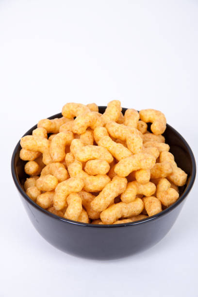 istock Bowl of peanut flips isolated on a white background 1465505929