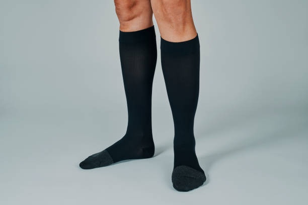 man wearing a pair of black compression socks