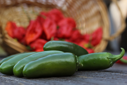 A closeup shot of Jalapeno and Cayenne Peppers at a local rural farmers market