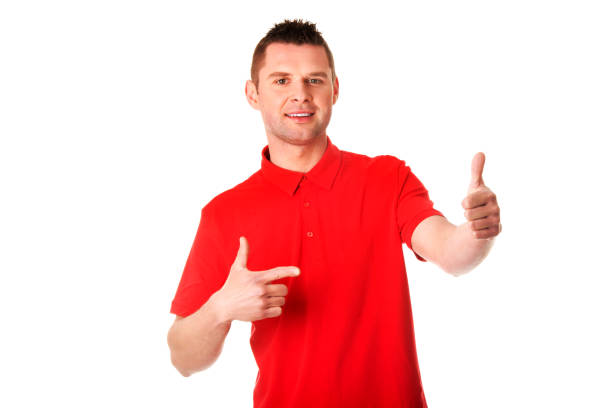 istock Cheerful handsome Polish man with thumbs up isolated on white background 1465510748