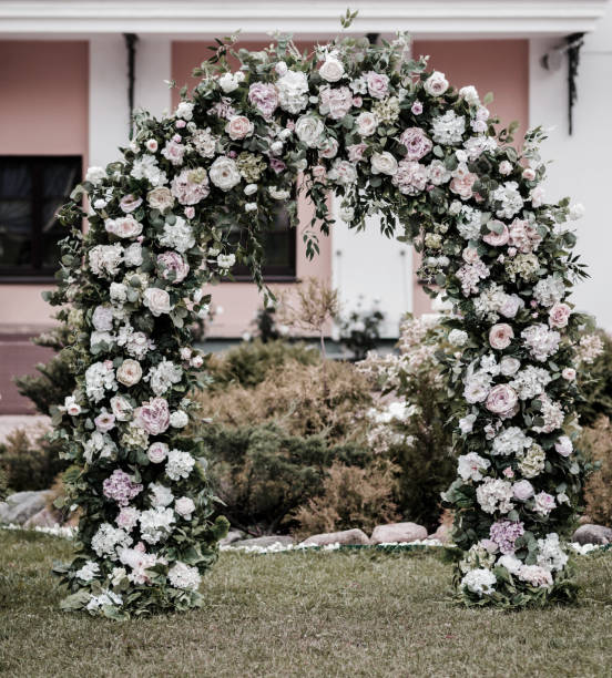 istock Beautiful wedding arch with flowers 1465512264