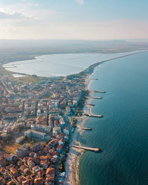 istock Bird's eye view of a blue beach with a peninsula 1465513899