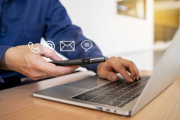 istock Businessman using Smart Phone with the email,  address, Chat message icons 1465514151