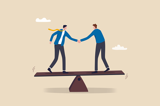 Negotiation for business winning, agreement or partnership deal for both benefit, merger and acquisition, professional talk concept, businessman handshake with success negotiation over balance seesaw.