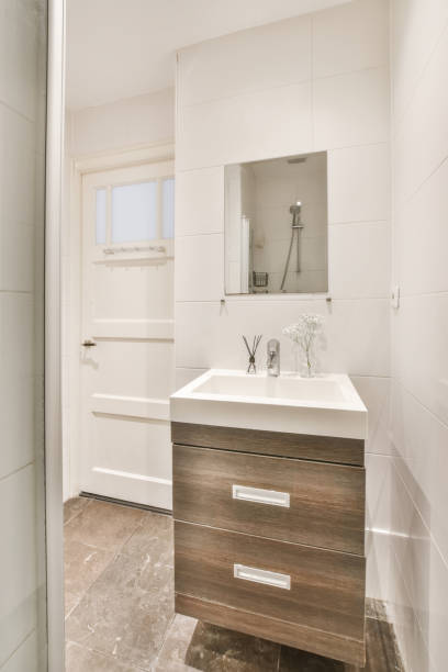 istock Mirror and washbasin in the minimalist style bathroom 1465516326