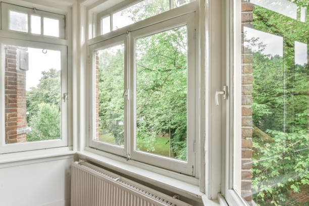 istock White windows of a living room facing the yard 1465516340